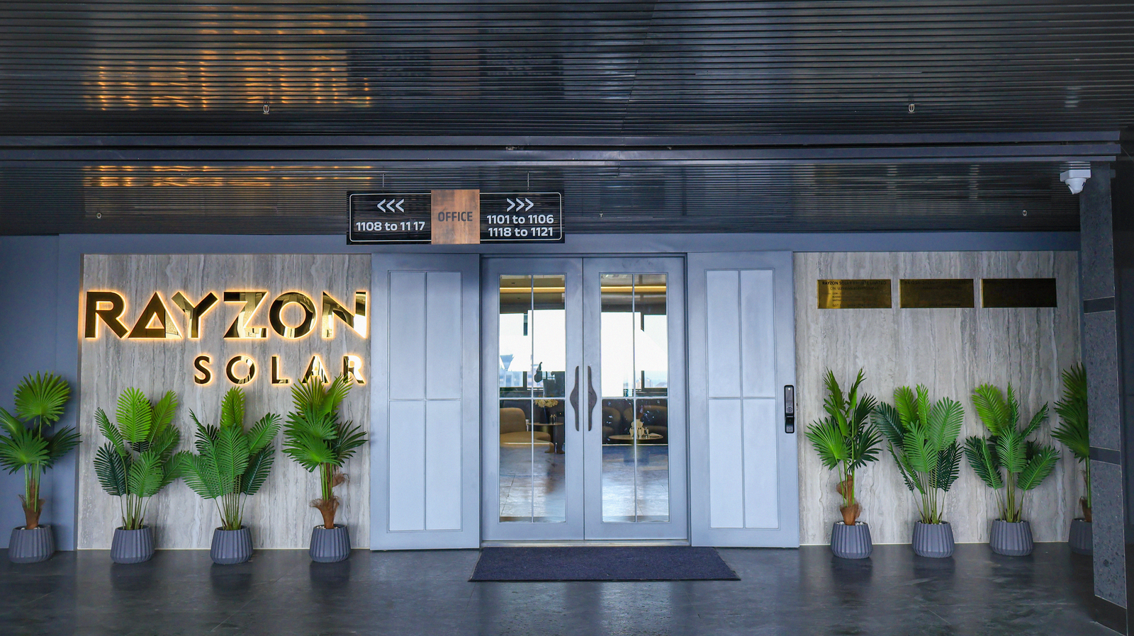 Diverse Rayzon Solar team collaborating in modern office